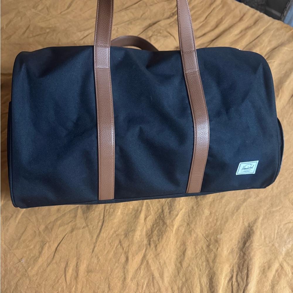 Herschel Supply Company Black and Brown Duffel Bag with Durable Fabric